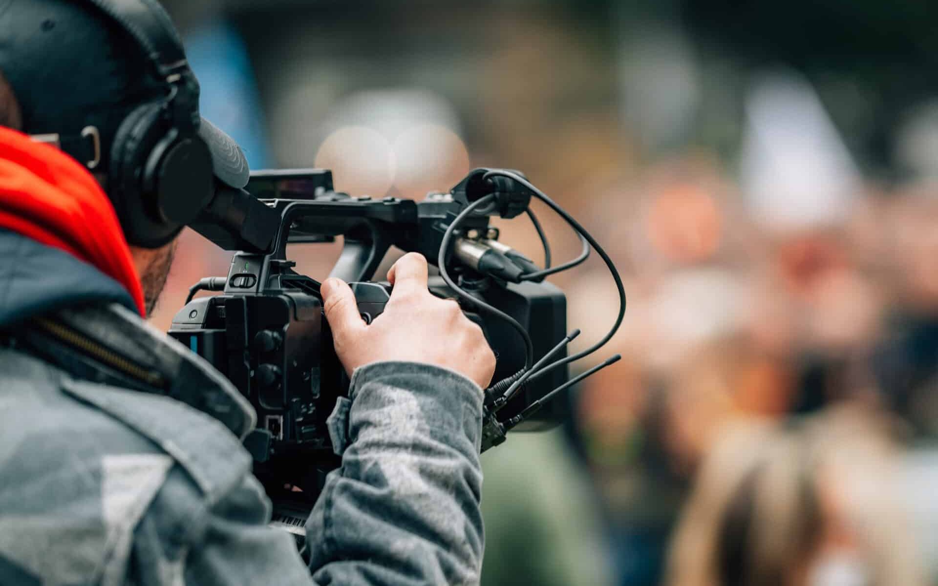Camera recording a public protest outdoors